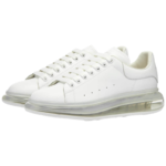 Alexander McQueen Oversized Sneakers featuring a white leather upper and a distinctive clear rubber sole - Image 2
