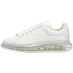 Alexander McQueen Oversized Sneakers featuring a white leather upper and a distinctive clear rubber sole - Image 3