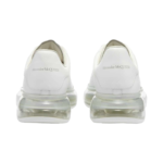 Alexander McQueen Oversized Sneakers featuring a white leather upper and a distinctive clear rubber sole - Image 4