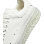 Alexander McQueen Oversized Sneakers featuring a white leather upper and a distinctive clear rubber sole - Image 5