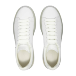 Alexander McQueen Oversized Sneakers featuring a white leather upper and a distinctive clear rubber sole - Image 6