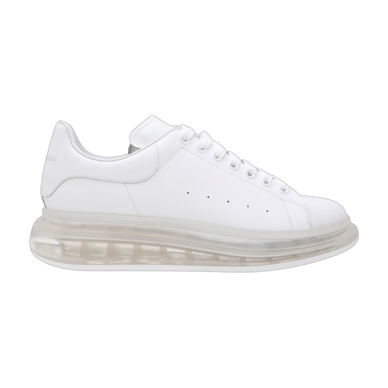 604232_WHX98_9000 Alexander McQueen Oversized Sneakers featuring a white leather upper and a distinctive clear rubber sole - Image 1