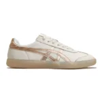 Onitsuka Tiger Tokuten sneakers in the white and rose gold colorway, featuring a distinct translucent rubber sole