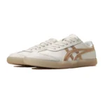 Onitsuka Tiger Tokuten sneakers in the white and rose gold colorway, featuring a distinct translucent rubber sole - Image 3