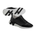 Hermès Bouncing sneakers in black with a distinctive white and black contrasting rubber sole - Image 2